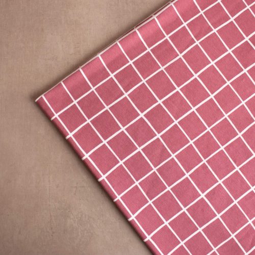 pink brushed eat fabric with white grid print