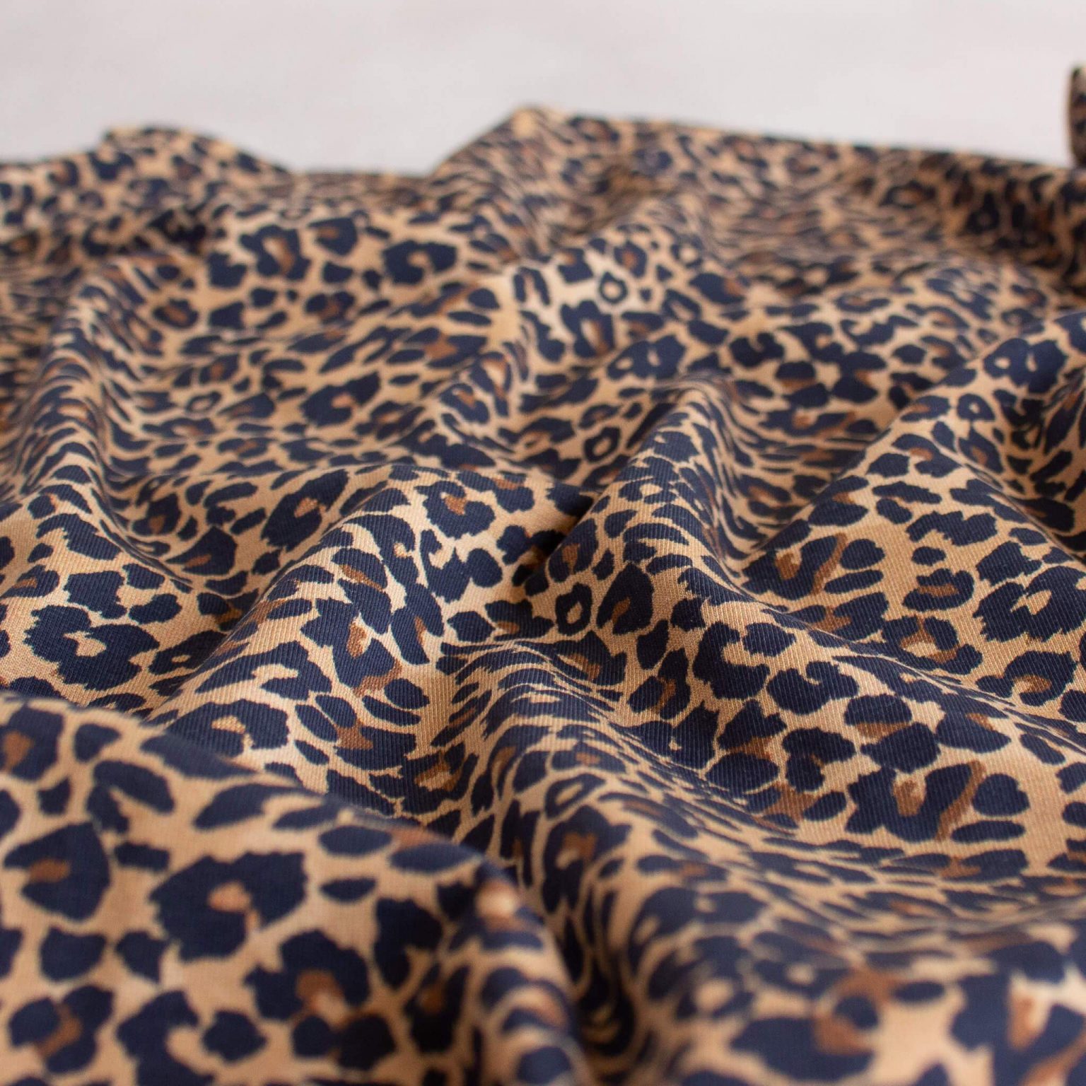 Leopard print jersey fabric scrunched up