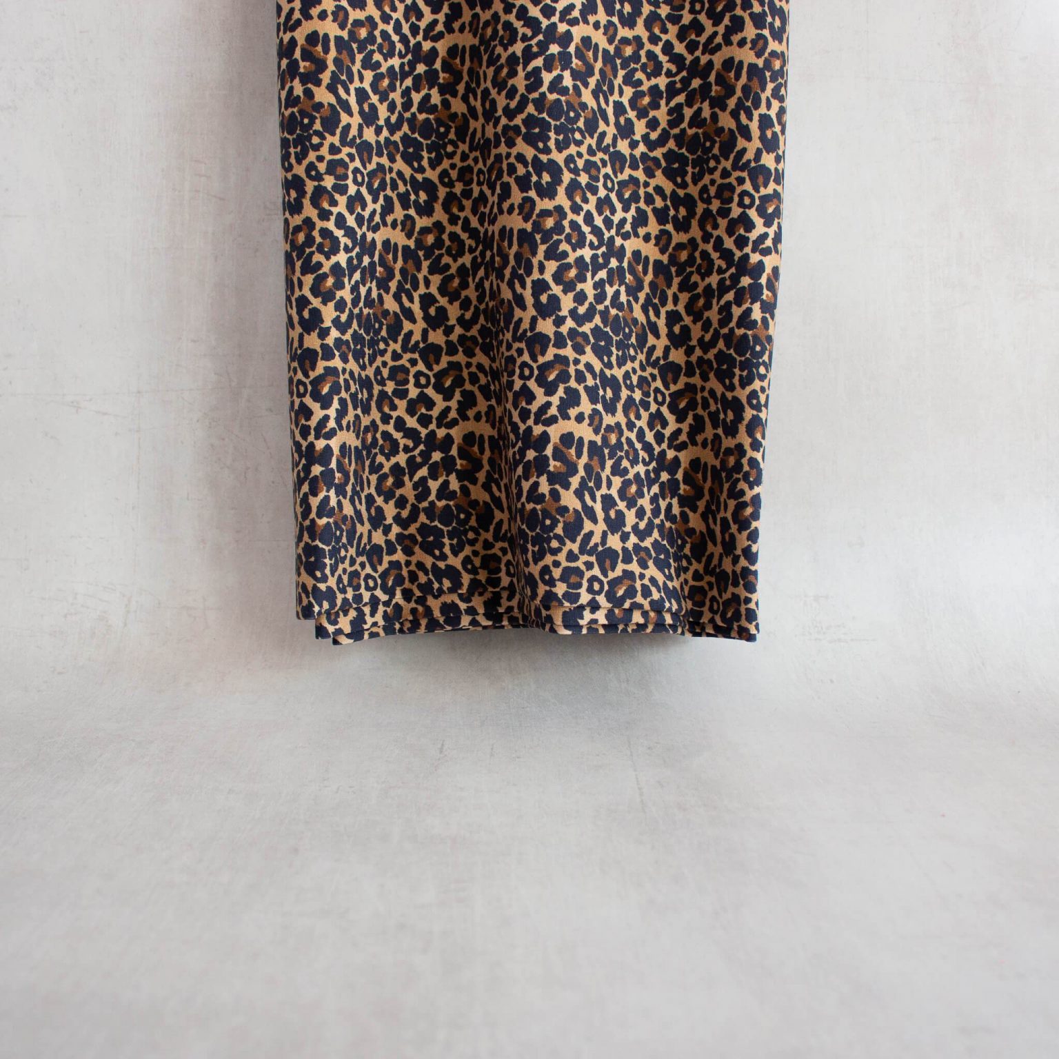 Leopard print jersey fabric hanging straight