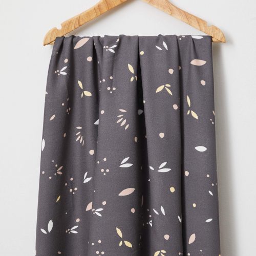 grey petal leaves fabric hanging on a hanger