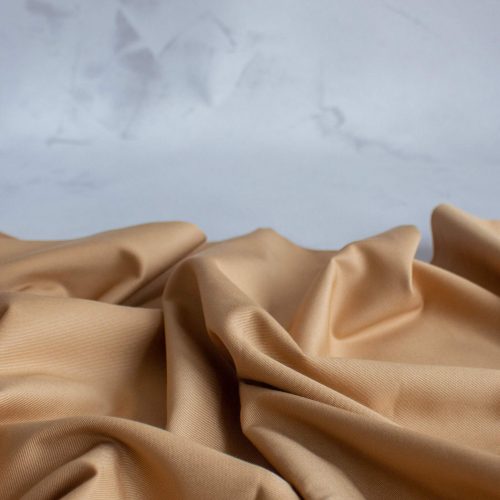 tan twill fabric scrunched up