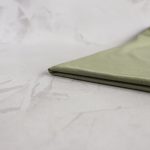 Sage tencel jersey neatly folded