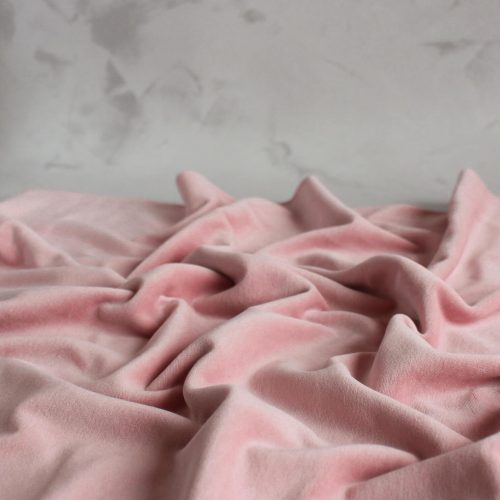 pink velour fabric scrunched up