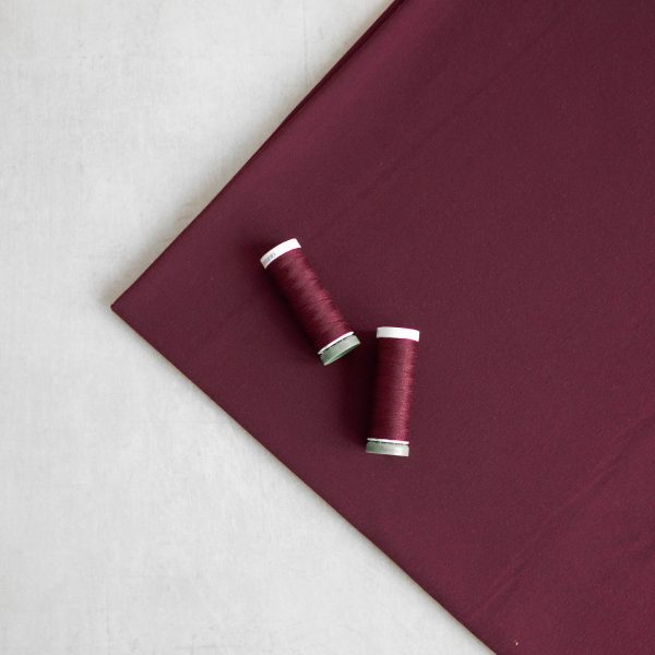 tencel jersey fabric in burgundy with matching threads