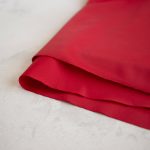 econyl fabric in baywatch red