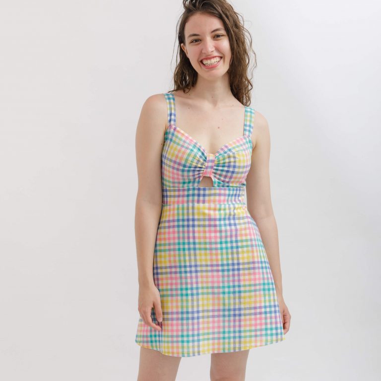model wearing colorful check print mini dress