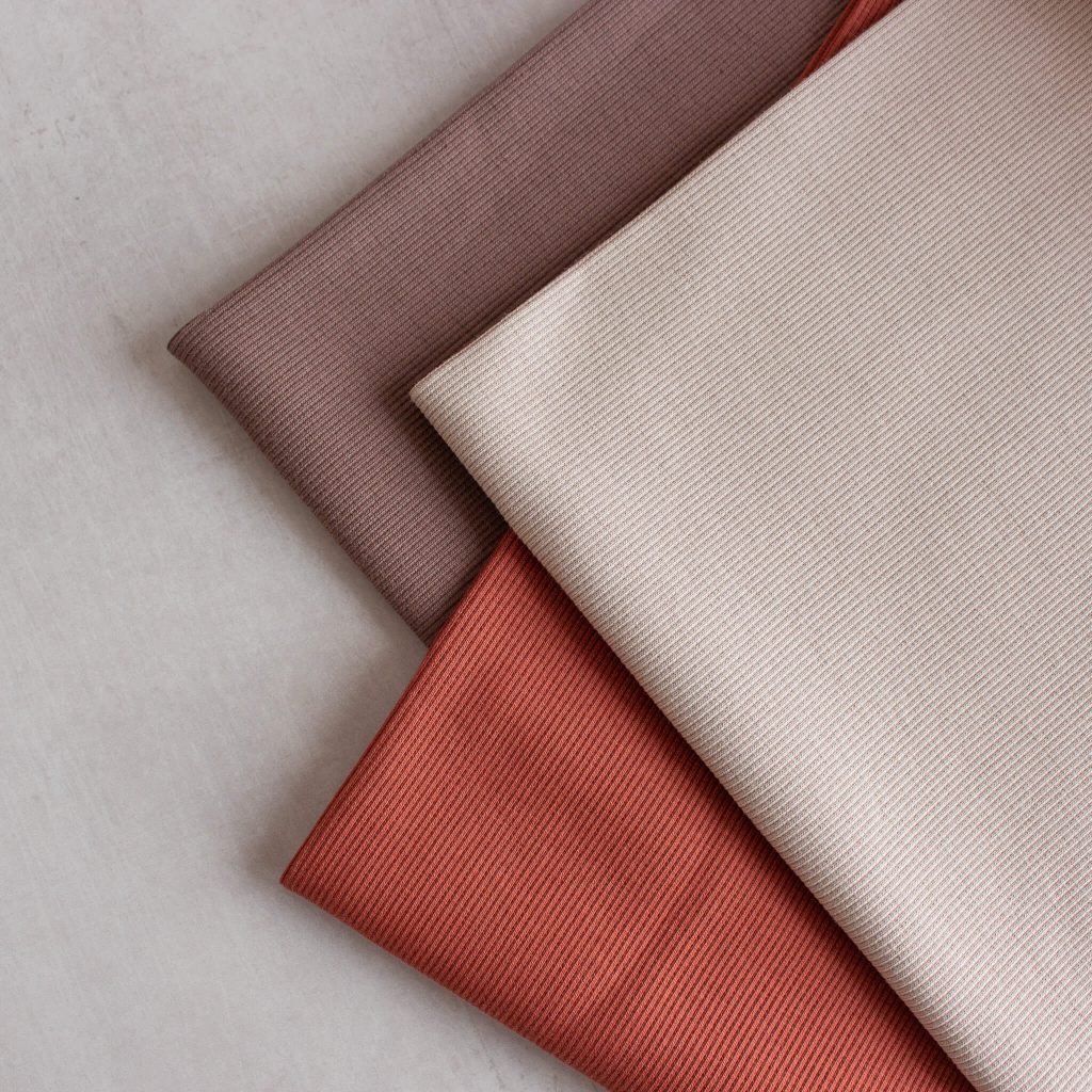 rib knit fabrics in brown, sienna and dune