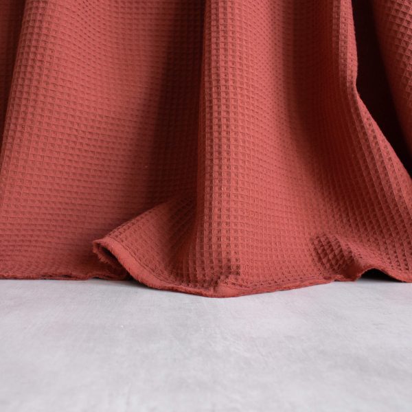 waffle fabric in brick red shade