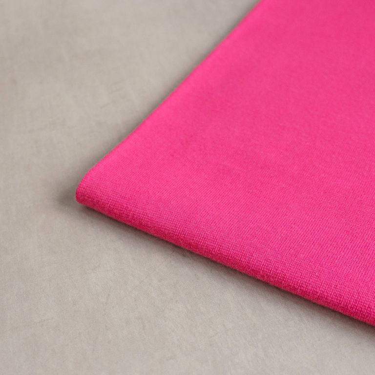 organic cotton tubular ribbing fabric in hot pink
