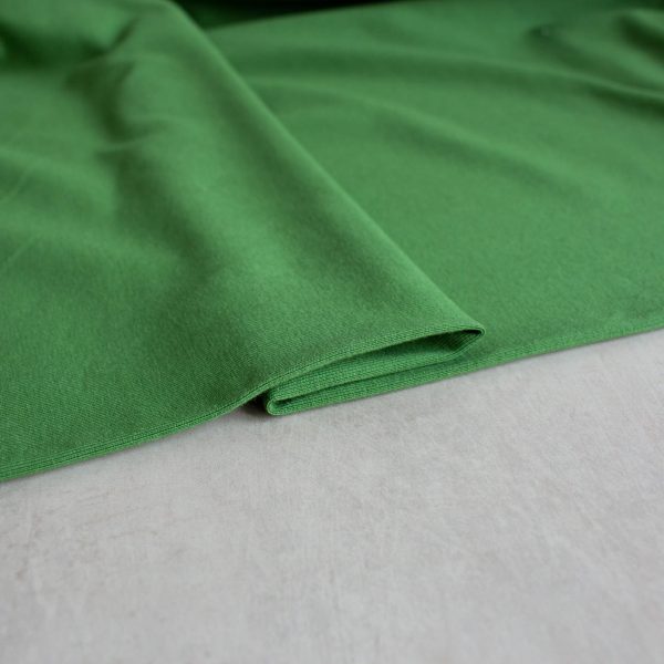 organic cotton jersey fabric in bright green colour