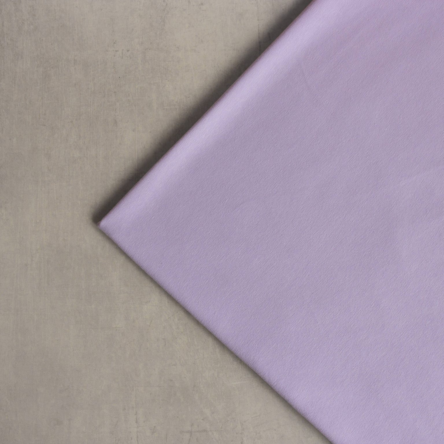 organic cotton jersey fabric in lavender haze