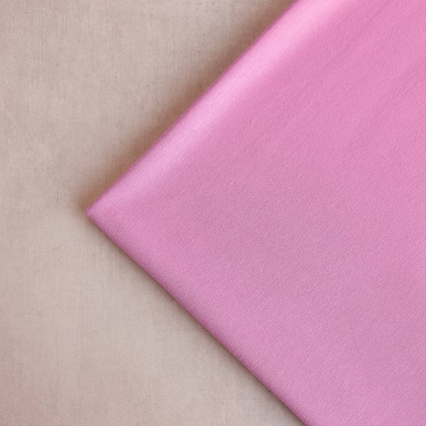 organic cotton jersey fabric in raspberry pink