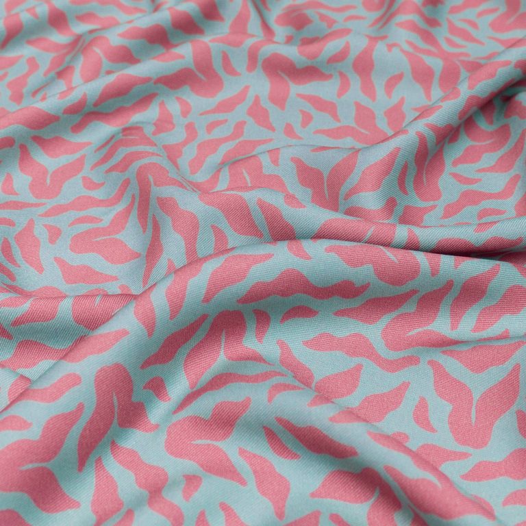 pink and blue printed fabric