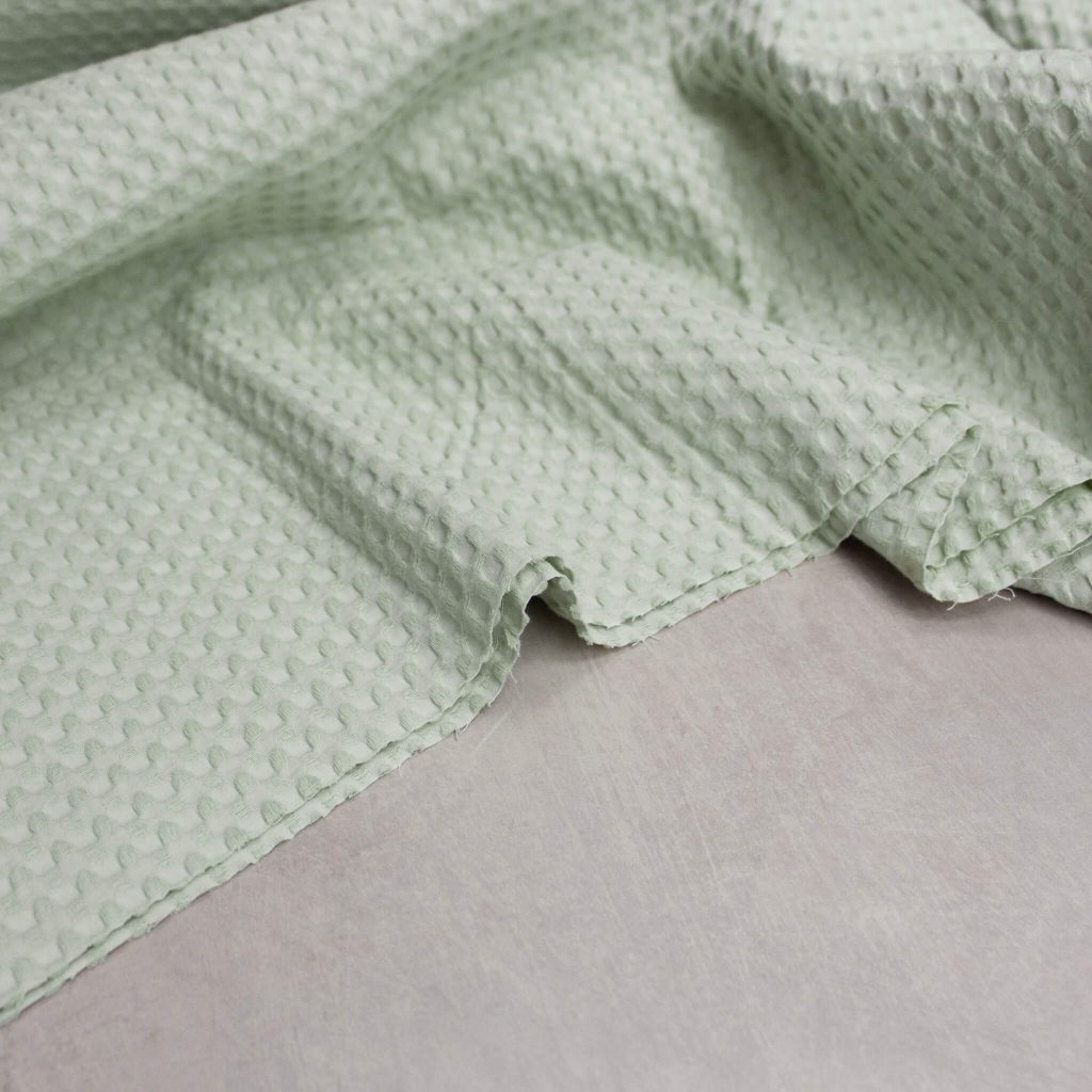cotton waffle fabric in sage green