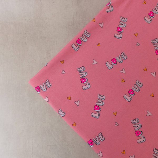 Love Print Cotton Jersey Fabric in Pink