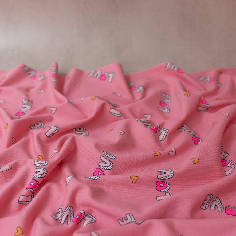 Love Print Cotton Jersey Fabric in Pink