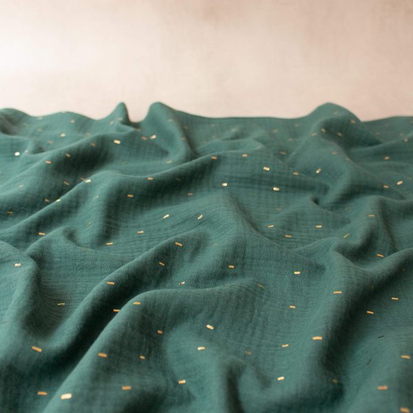 teal green cotton double gauze fabric sparkles with gold foil speckles