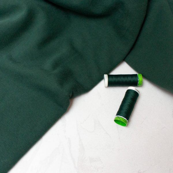 organic cotton soft brushed sweat fabric in green with two threads