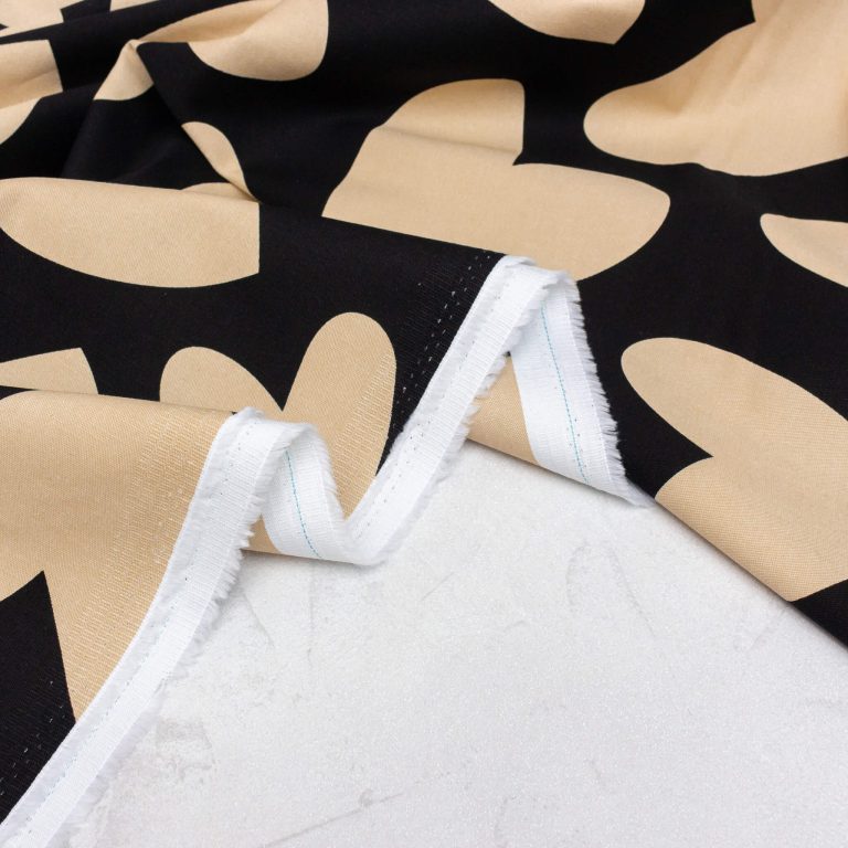 Cotton Denim Fabric with Stretch in Black with Cream Hearts