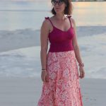 lisen wearing floral skirt and pink top