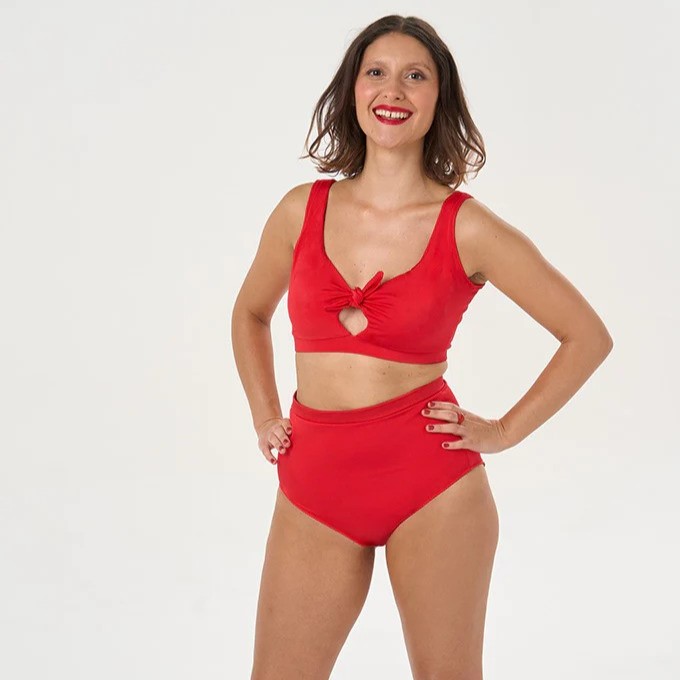 model wearing retro style bright red bikini