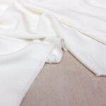 Eglantine & Zoe Viscose Crepe Fabric in Ivory White