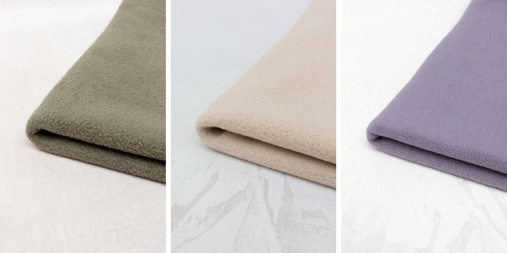 3 images of neatly folded sherpa fleece fabrics