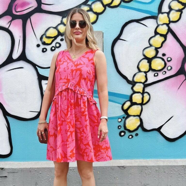 model wearing short bright pink summer sundress