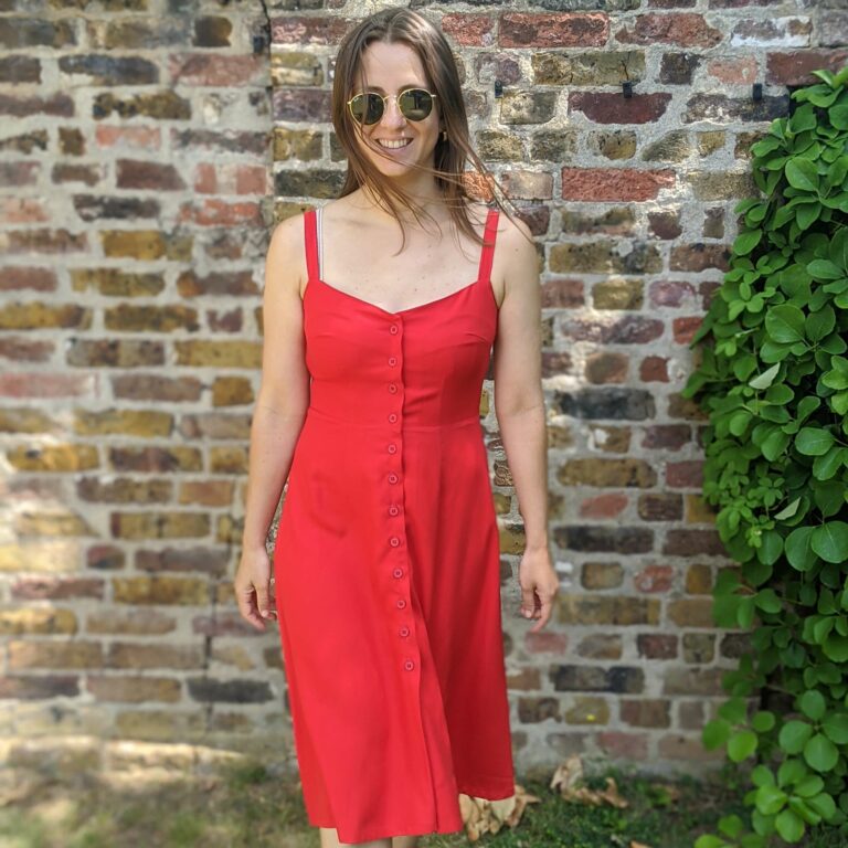 Polina wearing red sundress
