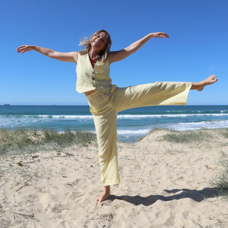 model wearing vest and trousers in matching yellow colour