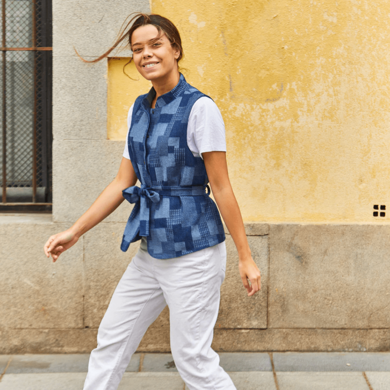 model wearing denim patchwork vest