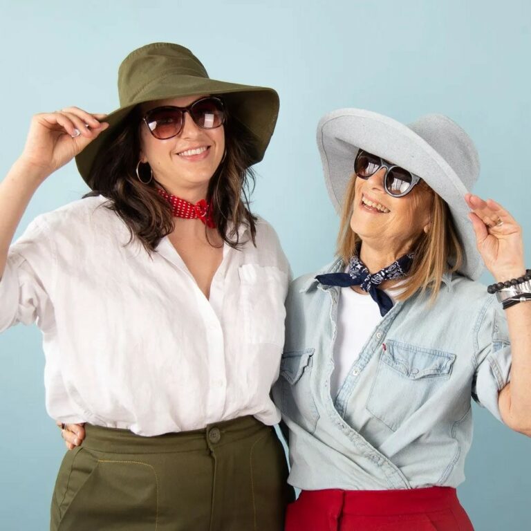 two models wearing sunhats