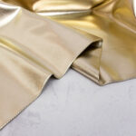 Metallic Cotton Twill Fabric in Gold