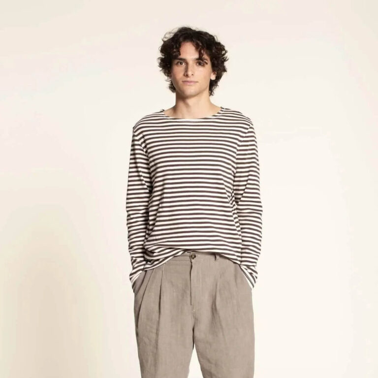 male model wearing stripey long sleeve top