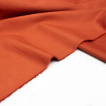 Stone Washed Cotton Twill Fabric in Burnt Orange
