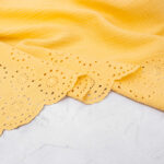 Broderie Double Gauze Fabric with Scalloped Edge in Butter Yellow