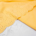 Broderie Double Gauze Fabric with Scalloped Edge in Butter Yellow