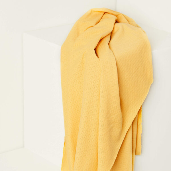 organic cotton gem pointelle fabric in butter yellow