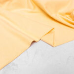 Organic Cotton Jersey Fabric in Buttermilk Yellow