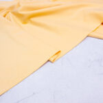 Organic Cotton Jersey Fabric in Buttermilk Yellow