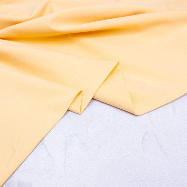 Organic Cotton Jersey Fabric in Buttermilk Yellow
